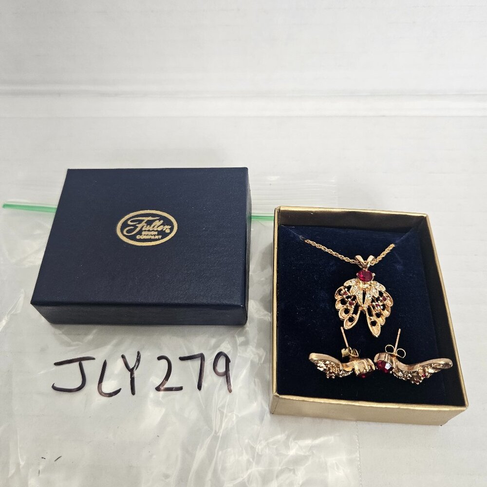 FULLER BRUSH COMPANY GOLD TONED RED STONE WINGED PENDANT NECKLACE AND EARRINGS